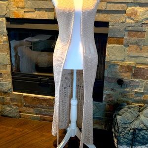 Knee length knitted vest